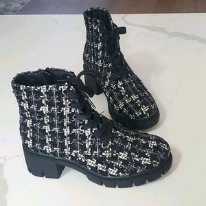 Chanel looking combat boots